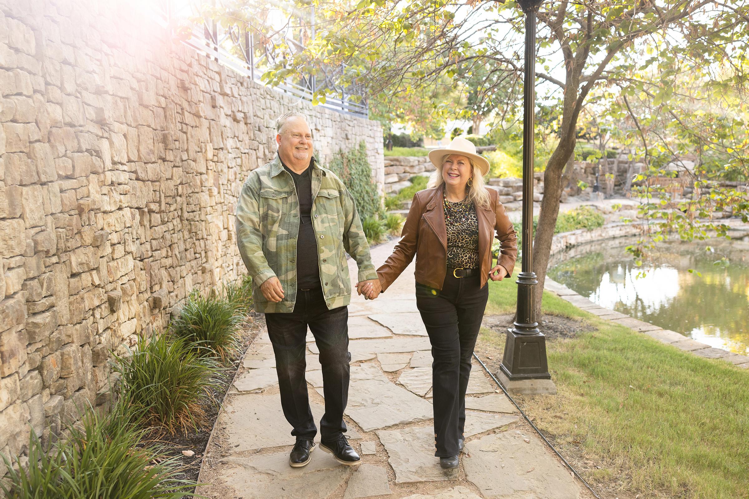 Randy and Carol Speed walking on a path